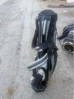 Golf bags and clubs