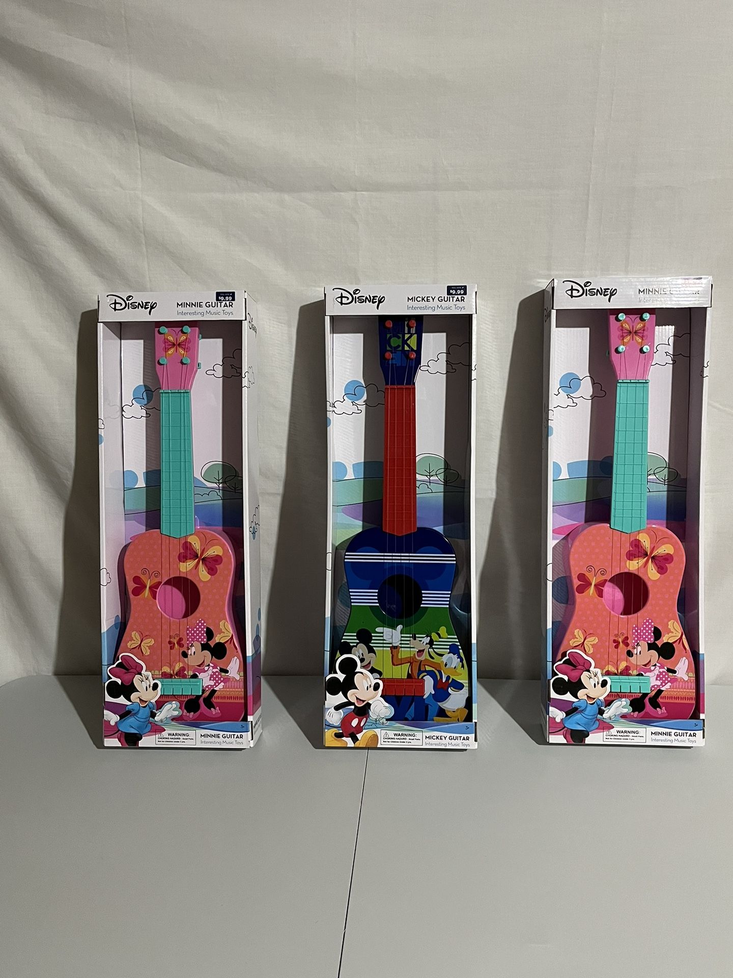 Mickey and Minnie guitars 23 1/2 inches tall