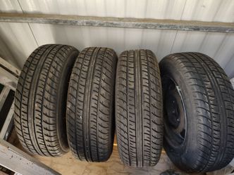 185/70 R14 steel wheels and tires