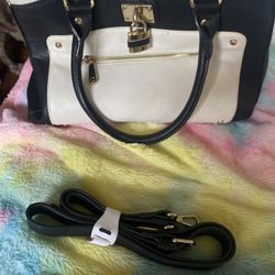 Beautiful pre owned Navy Blue and cream white Hand Bag with straps that attached