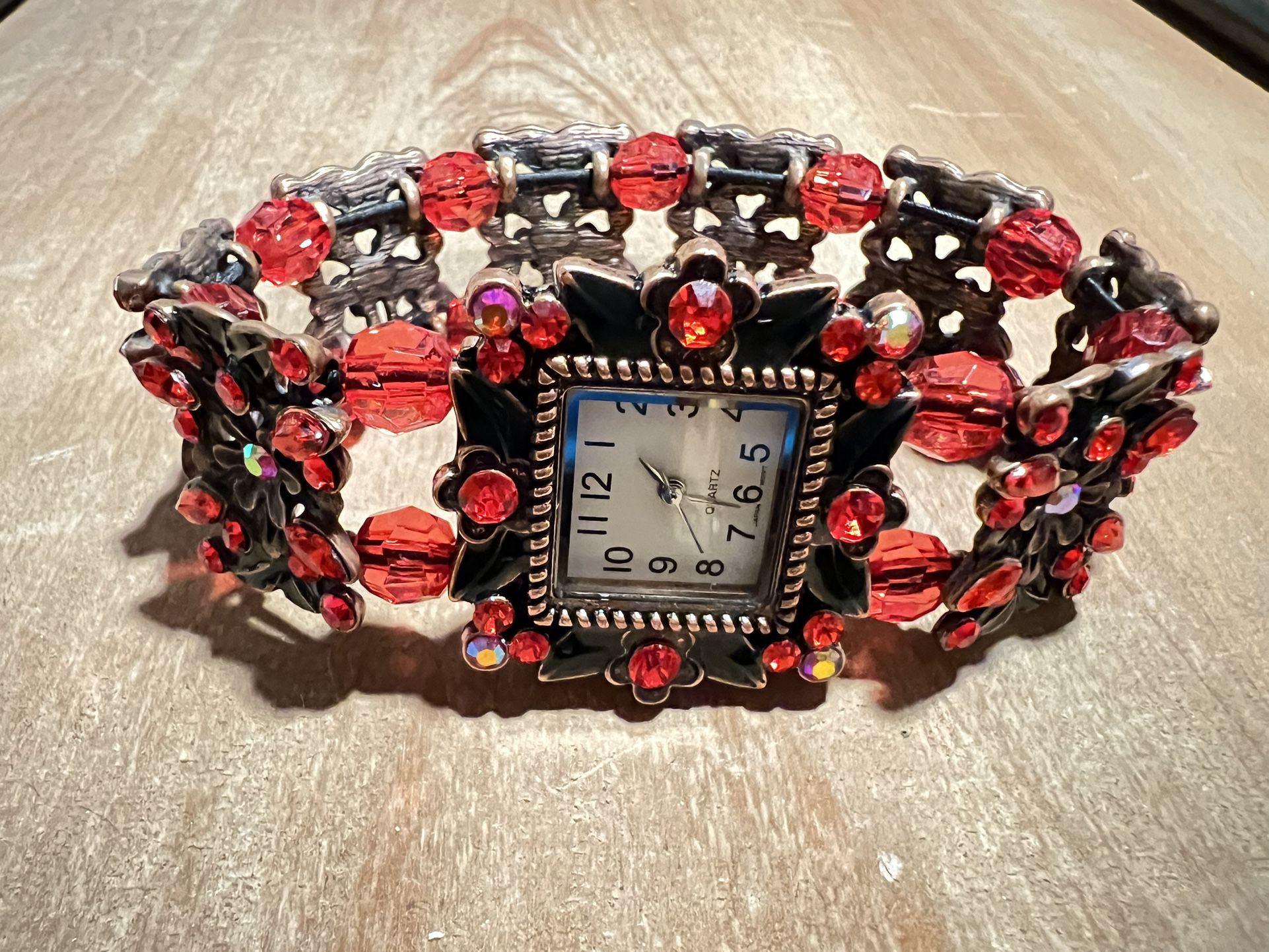 Watch vintage  Gorgeous Vintage Beaded Stretch Watch The battery works  It’s missing a stone, details in the photo