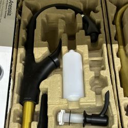 Kohler kitchen faucet features a pull-down sprayer and a distinctive two-tone matte black