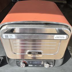 Ninja Woodfire 8-in-1 outdoor pizza oven with stand