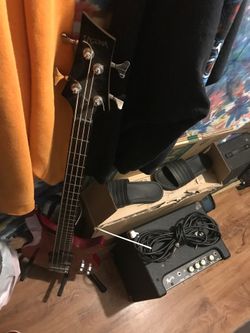 Laguna bass guitar with amp and cord will trade for a newer iPhone or equal value