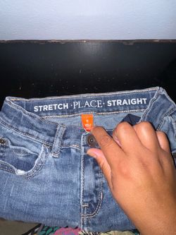 Children place jeans