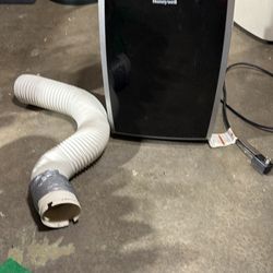 Honeywell 12,000 BTU Portable AC.  Host Included - See Photos