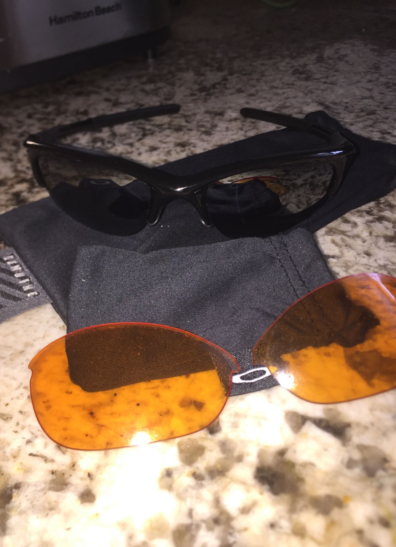 Men’s Oakley sunglasses with interchangeable lenses like new worn once or twice