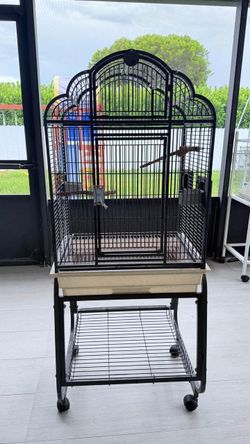 Large black metal bird cage in good used condition.