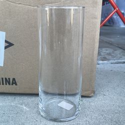 Tall glass cylinder vases with pillar candles