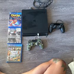 PlayStation 4 + 2 Remote Controllers + 3 Games