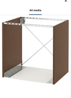 The IKEA SEKTION base cabinet frame for a built-in oven in wood effect brown