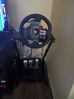 Logitech G29 steering wheel with pedals and stand