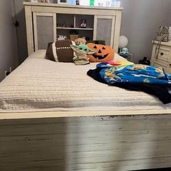 Queen size bed frame and dresser.. 
