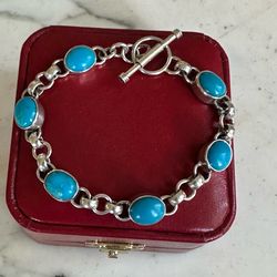 Vintage 925 Sterling Silver w/ oval turquoise gemstones, marked 925 w/ symbol, toggle closure , rolo link chain