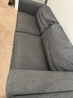 Dark grey fabric sofa