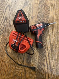 Speaker , Drill, And Charger And A Battery