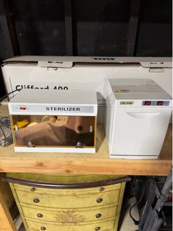 New sterilizer and towel warmer sold as a pair