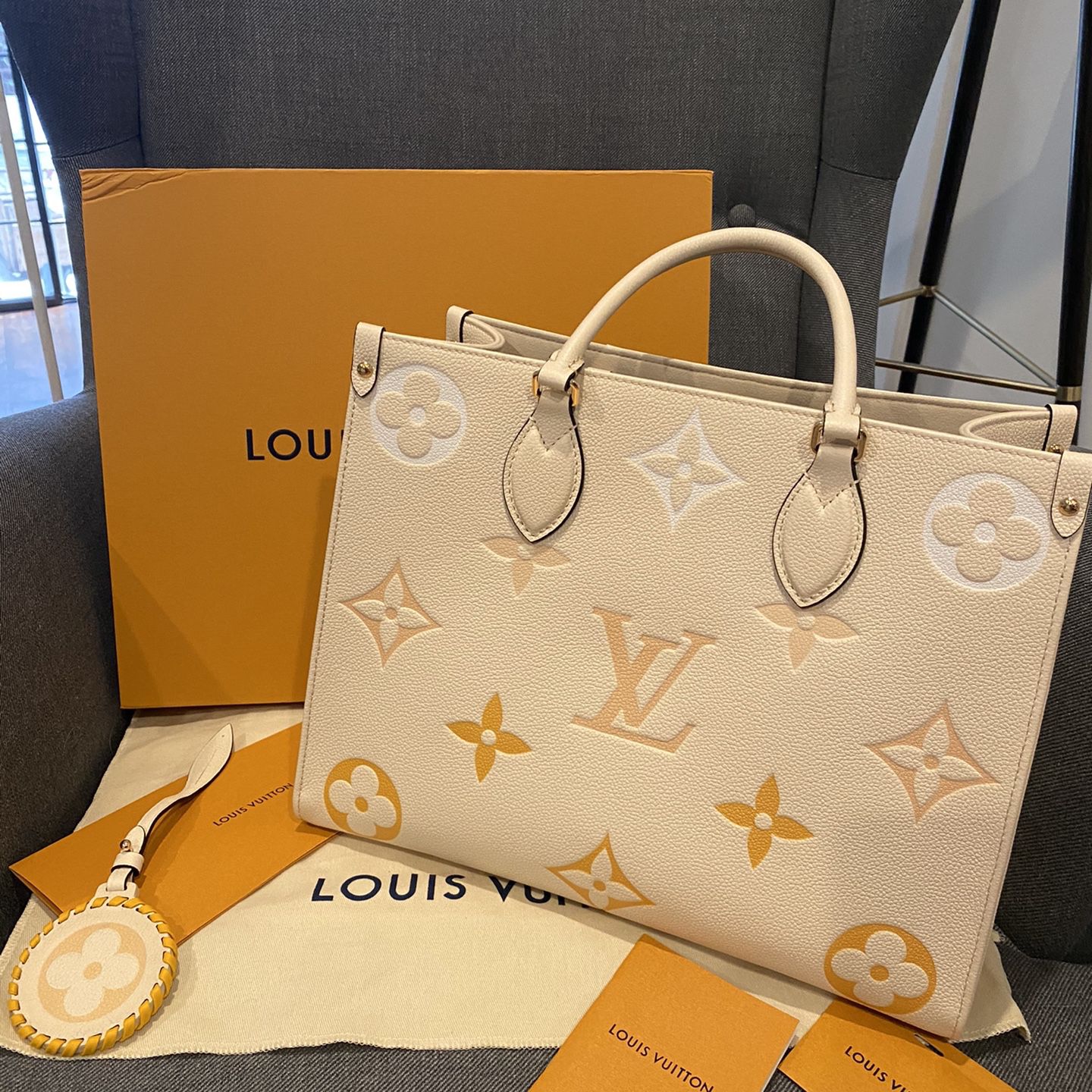 LV onthego small size with dust bag and box