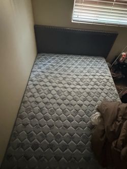 Barely used Queen bedframe + boxspring + mattress. Gray color.