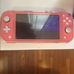 Nintendo Switch Lite And 2 Games