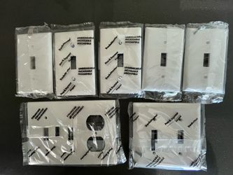 Electrical toggle wall plates