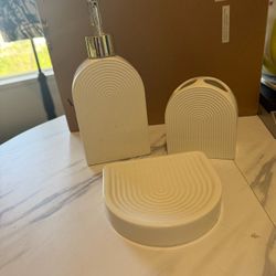 Three-piece, elegant, ceramic bathroom set