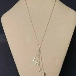 RARE Tiffany & Co. Diamond LOVE Letter Necklace