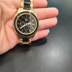 Woman New York & Company (NY&C) women's fashion watch.