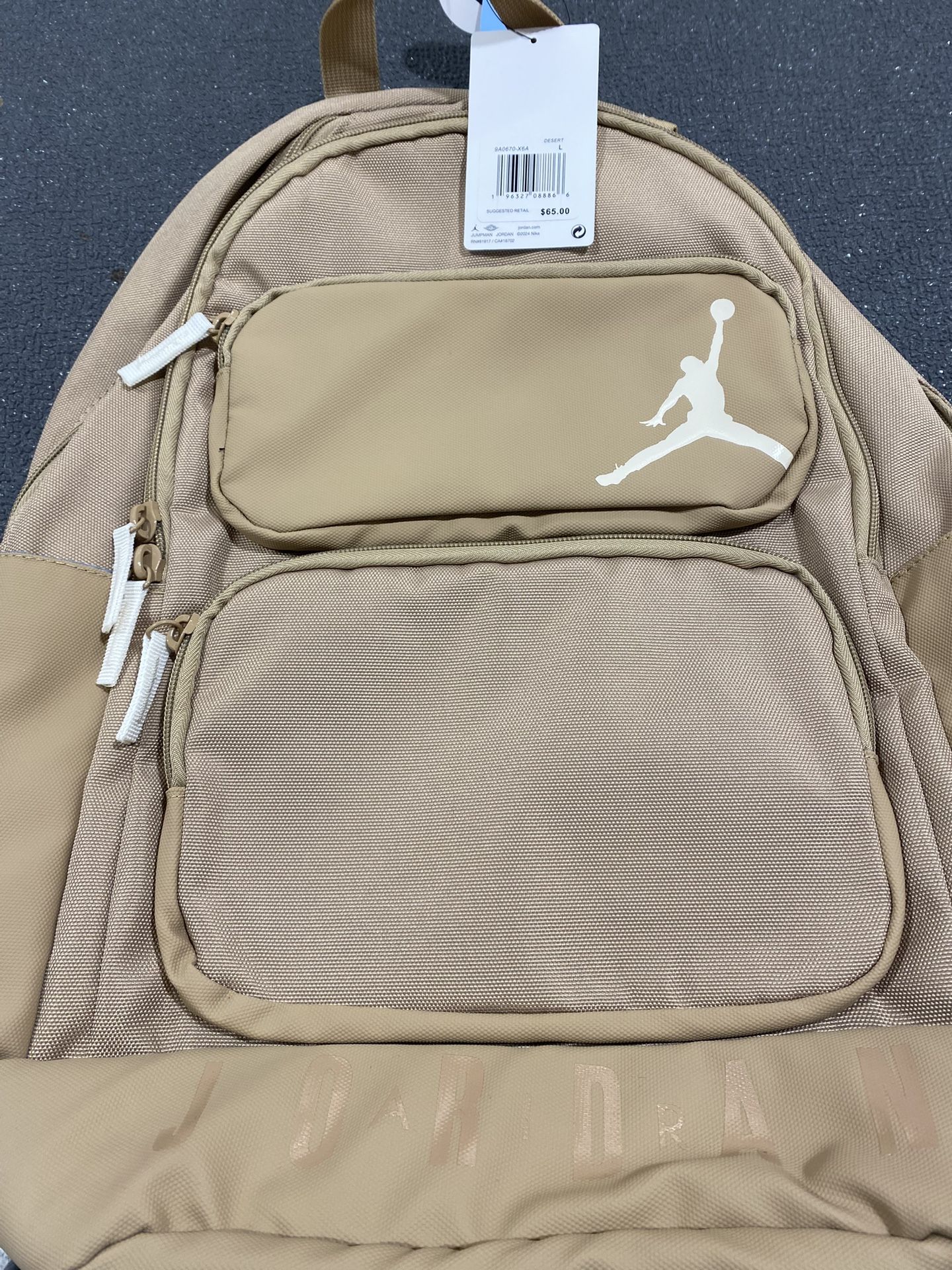 L Jordan beige backpack
