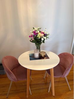 Modern farmhouse table with chair dining set. Pink chairs