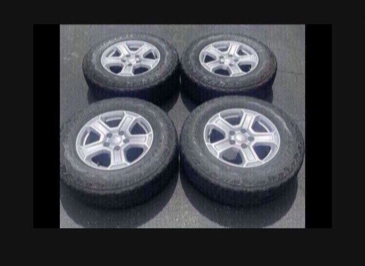 4 X 245/75r17 5x5 5x127 Jeep JK wrangler Stock Aluminum Wheels Rim 70% Tire Treads !!!!!