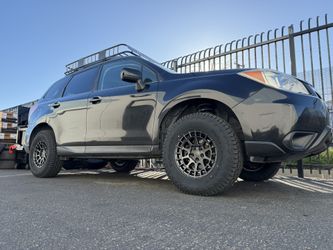 Subaru Forester Lift Wheels N Tires $1599 Installed And aligned 15inch Black Rhino Boxers W/ 235:75r15 Ridgecrawlers