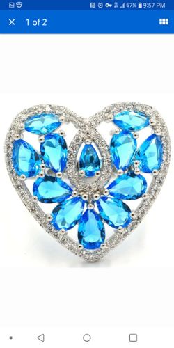 Beautiful created Swiss blue topaz silver filled ring size7