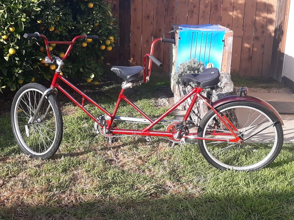 Tandem bike , brand unknown .