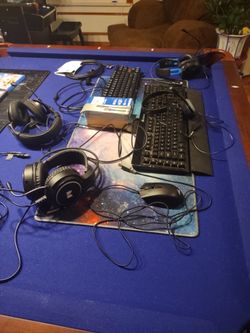 Assorted Electronics For P.C. PlayStation 4 or 3 : 2 Mousepads : 4 PlayStation Controllers: 4 Headsets: 2 Dual Chargers, And 5 PlayStation Video Games