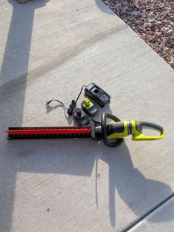 RYOBI 18V 22 in. Lithium-Ion Cordless Hedge Trimmer with 2.0 Ah (2) Batteries and charger