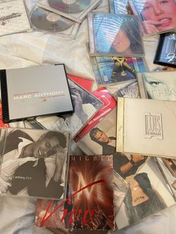 More than 100 original pop, rock, Latin, northern CDs