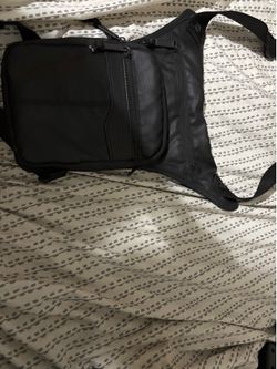 Black Small Unisex Crossbody Bag Adjustable Strap Zip Closure Multiple Pockets