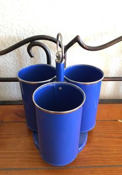 Blue metal rotating utensil caddy