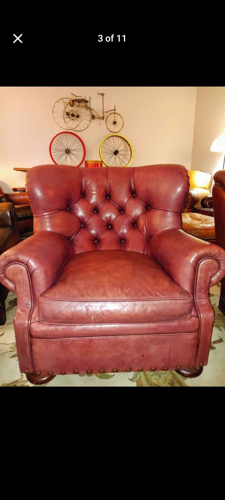 A Pair Of Limited Edition wing-backed Writer's Leather chairs with a matching ottoman by Ralph Lauren