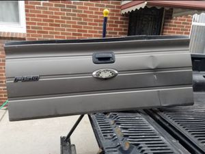 Photo Ladder tailgate complete, Ford F150 small dent.