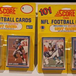 Two (2) 1990 Score football blister pack with Barry Sanders and Lawrence Taylor showing!