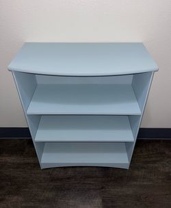 Sturdy solid adjustable height shelves /book case in antique blue