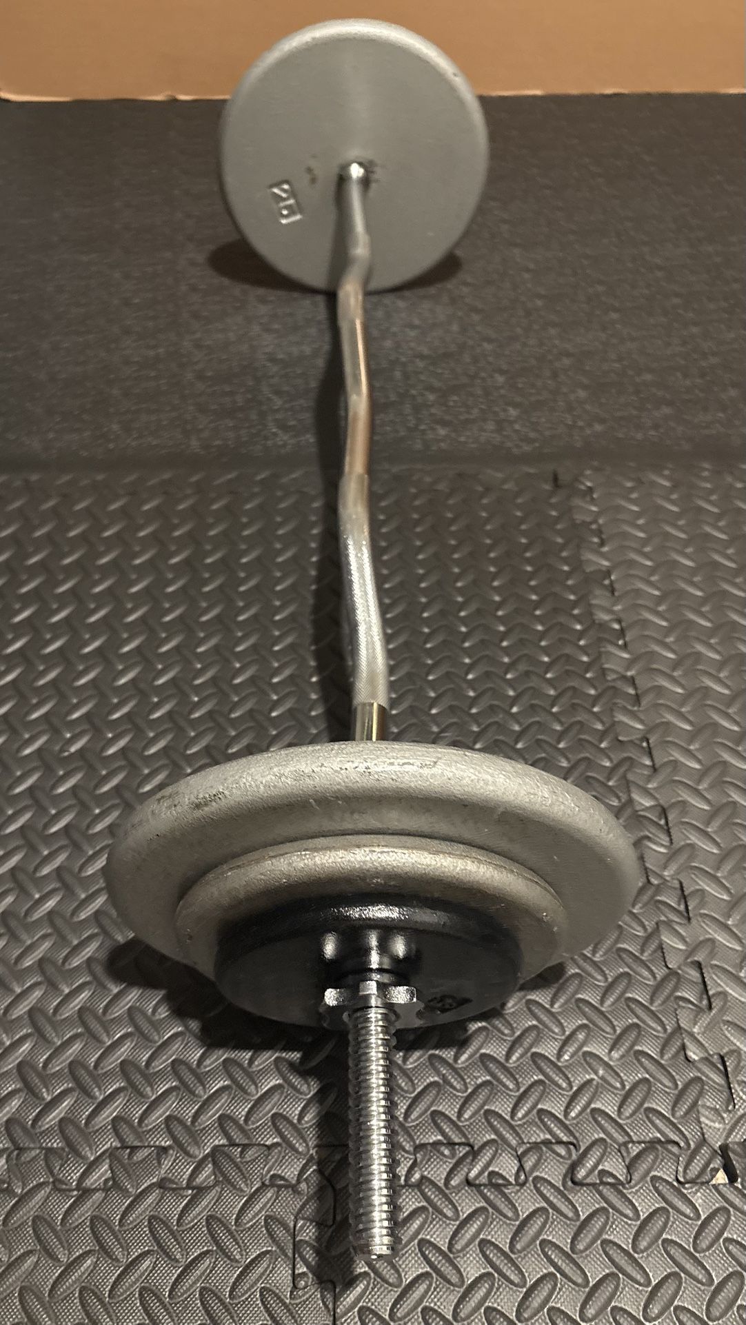 NEW Standard Steel Curl Bar with Cast Iron Weight Plates Gently Used pairs: 24#, 10 & 5 #. Total: 96 pounds