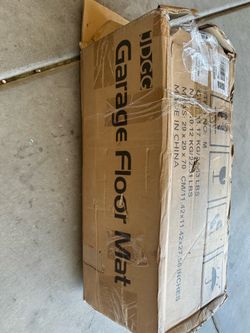 Garage floor mat. Brand new!