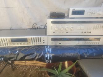 Sansui A-9 Integrated Amplifier (DC servo, ~65 W/ch into 8 Ω, with MM/MC phono stage)
- Sansui RG-7 Stereo Graphic Equalizer Consolette (10-band graph