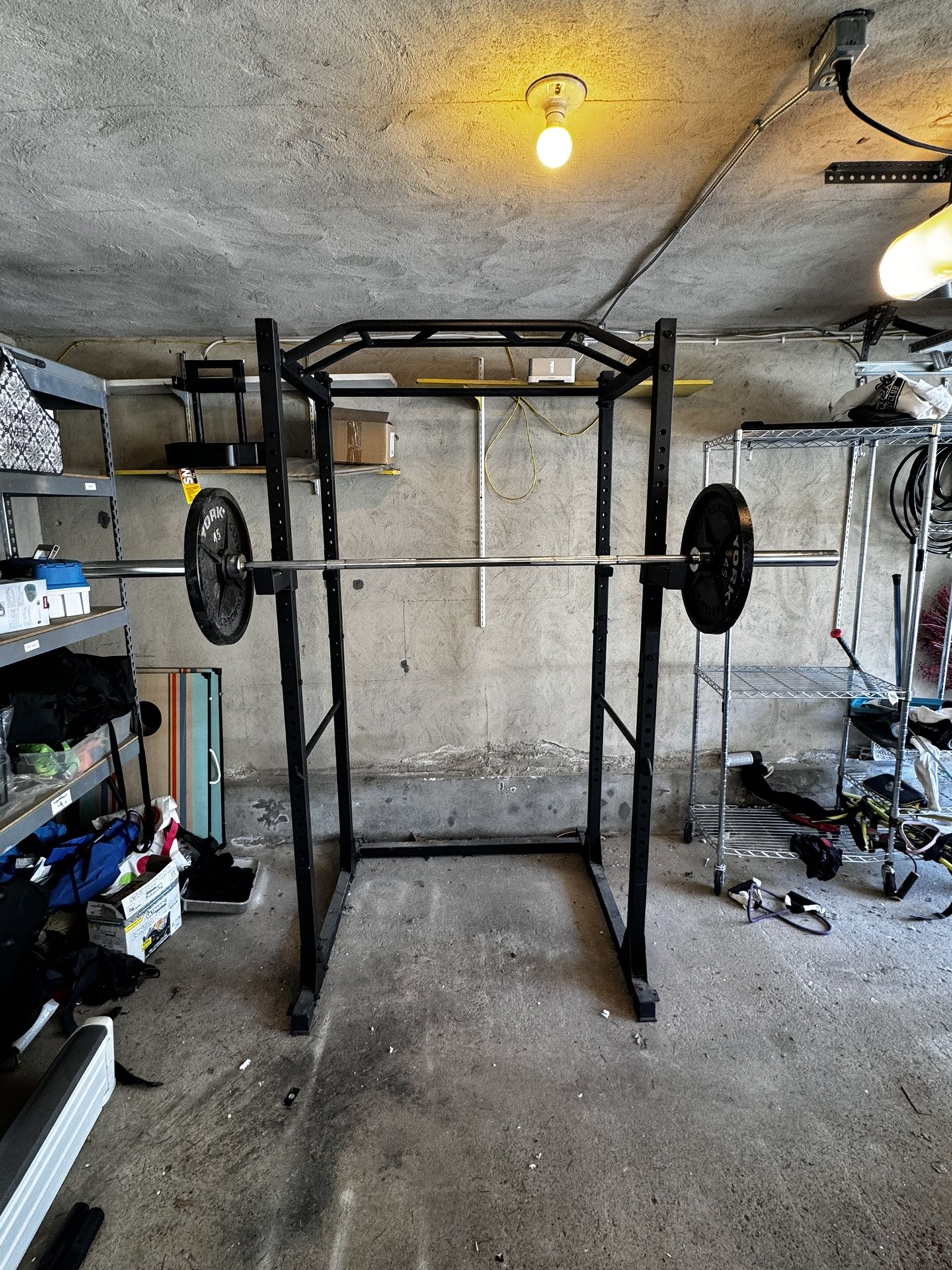 Squat Rack with a Barbell and 2 45 pound Plates