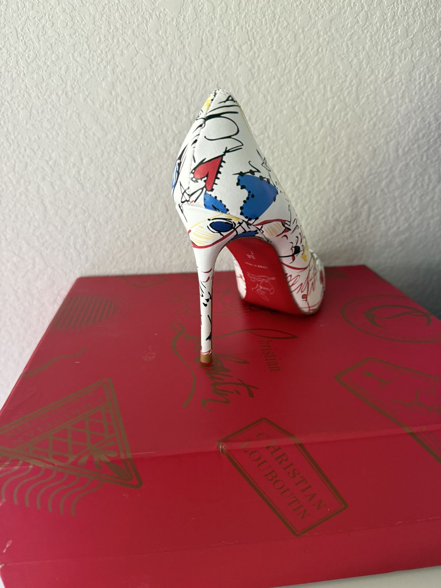 Christian Louboutin (Red Bottom)