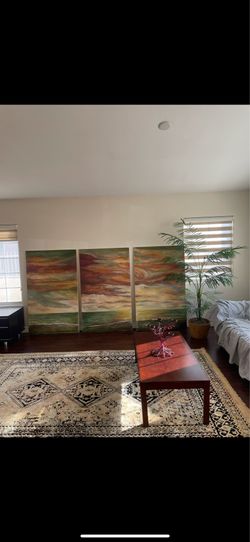 three large paintings
