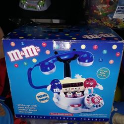 M&M telephone and alarm clock radio New